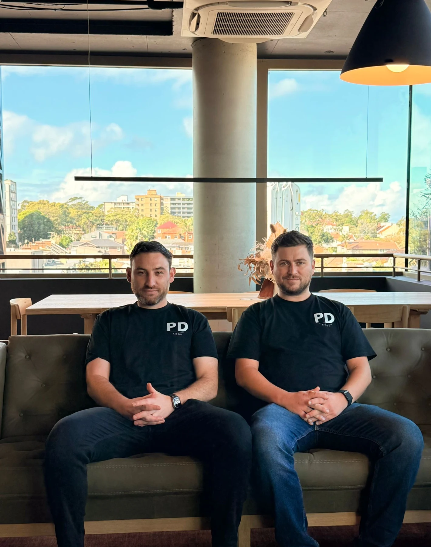 Sean Donnelly and Lewis Perry together, wearing PD Talent shirts.